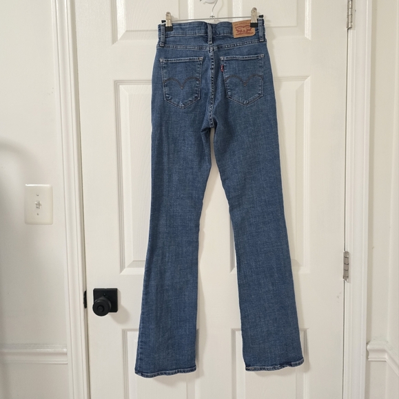 Levi's High Rise Bootcut Jeans In Medium Wash Size 26 - Picture 5 of 6